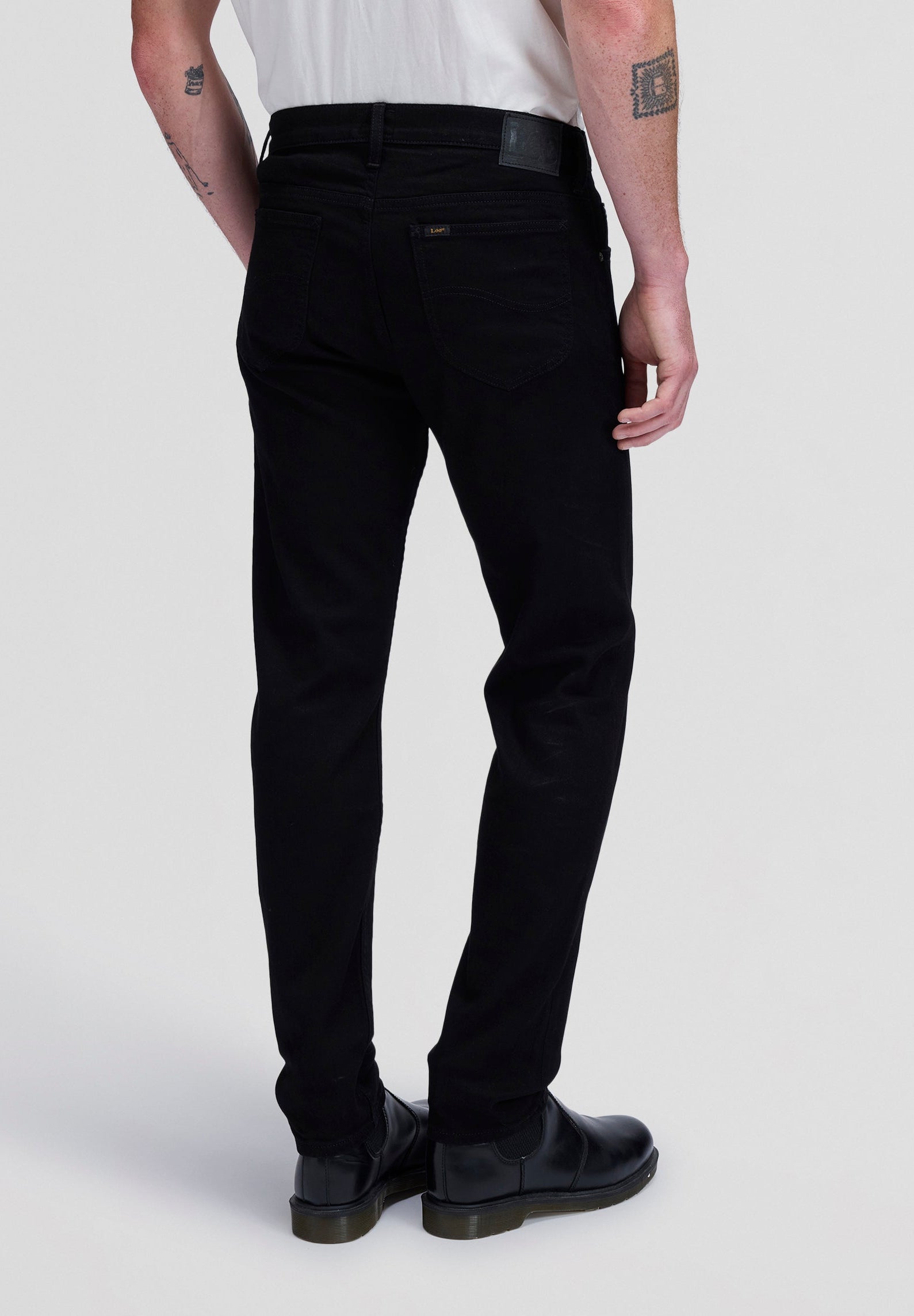 Rider in Clean Black Jeans Lee