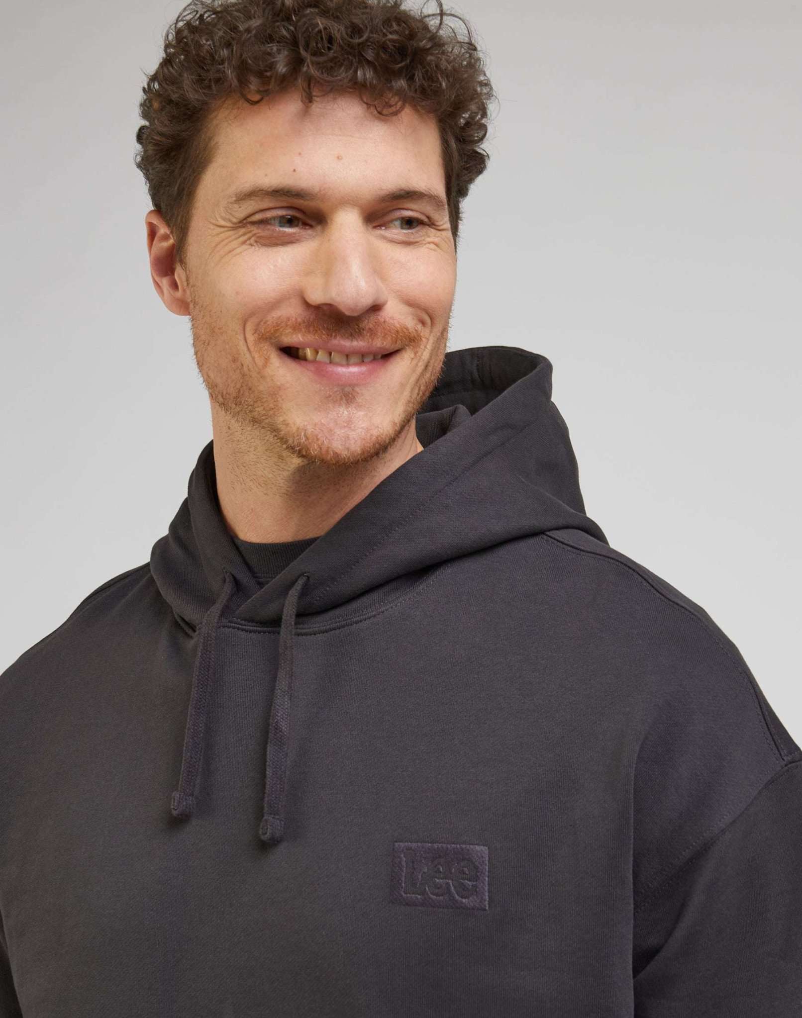 Core Loose Hoodie in Washed Black Kapuzenpullover Lee