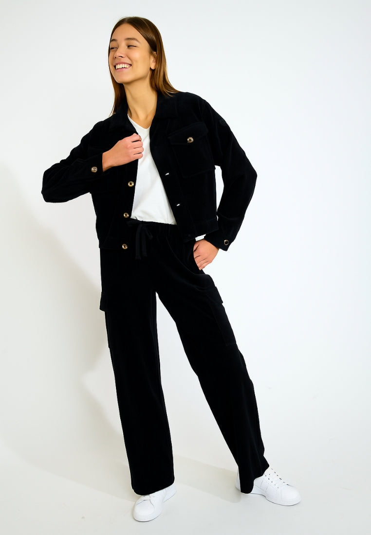 BEYOND-QUANDARY Cord-Jogginghose in Noir Hosen Banana Moon