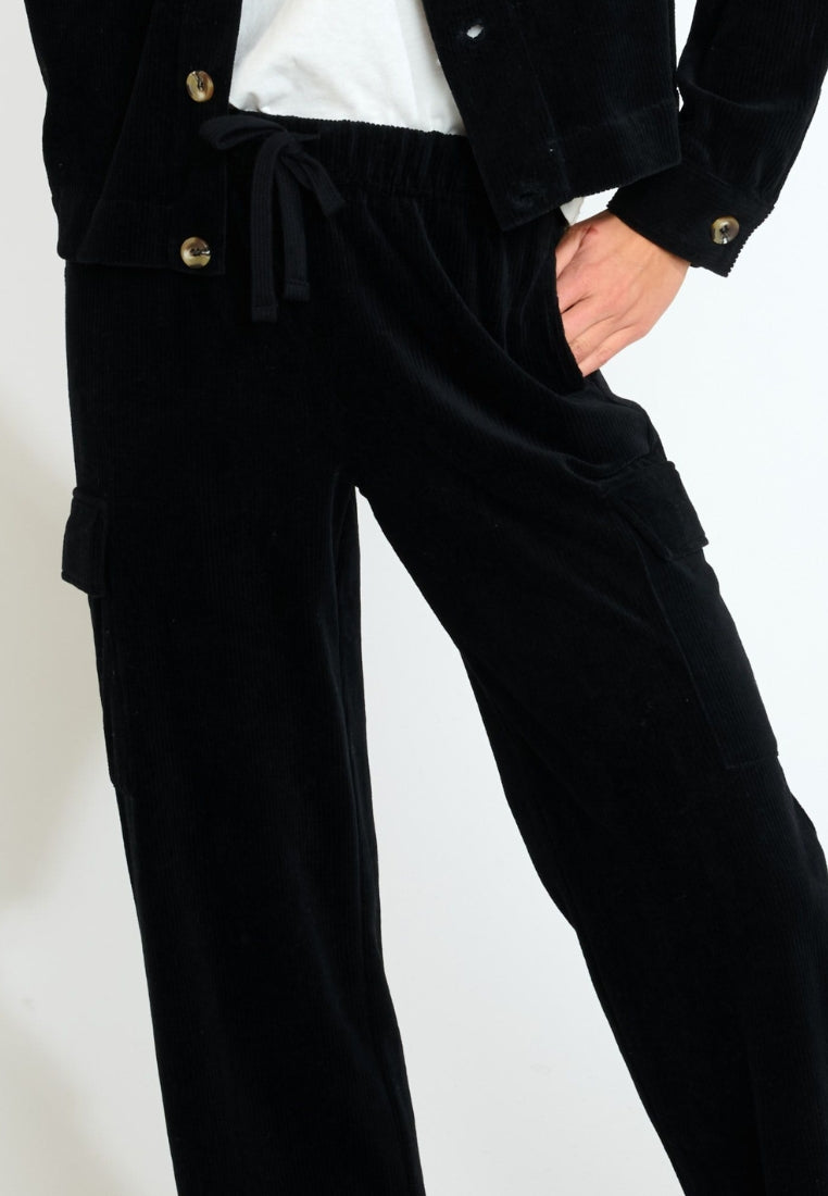 BEYOND-QUANDARY Cord-Jogginghose in Noir Hosen Banana Moon