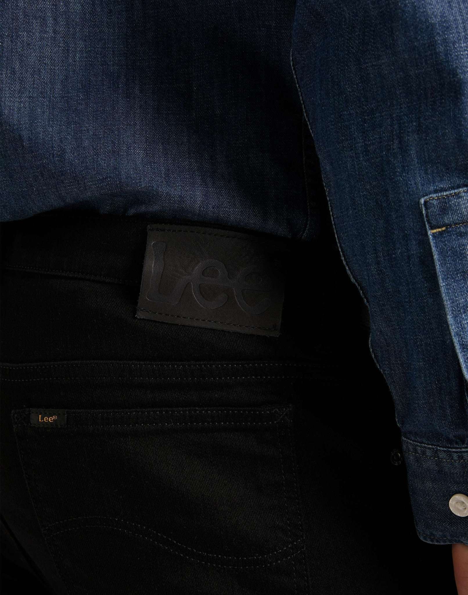 Rider in Clean Black Jeans Lee
