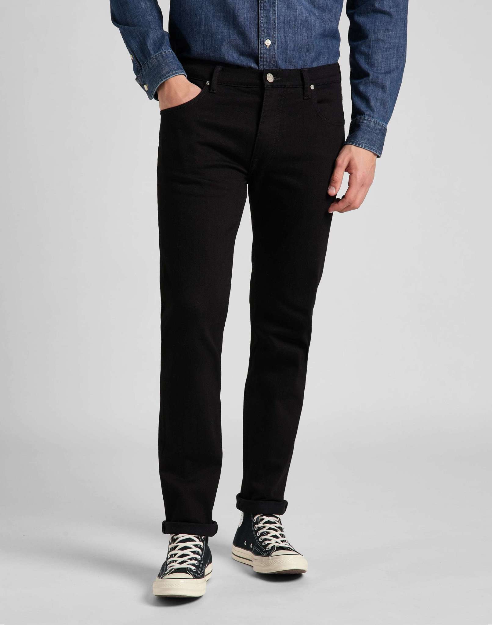 Rider in Clean Black Jeans Lee