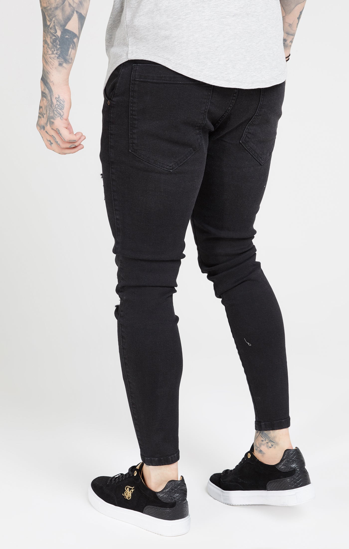 Essential Distressed Skinny Jean in Black Jeans SikSilk