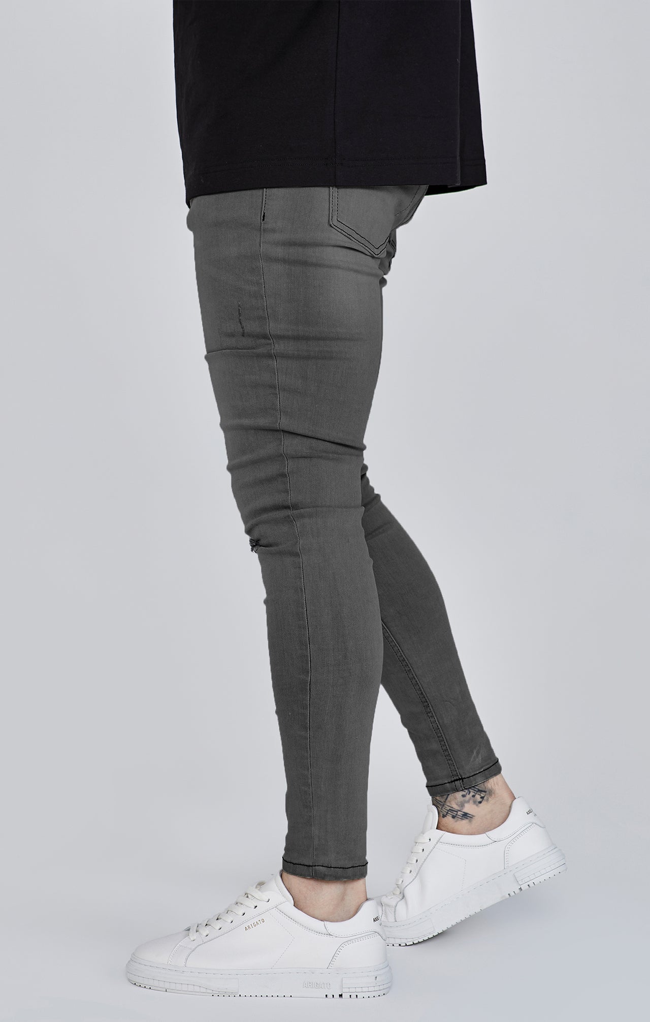 Distressed Skinny Jeans in Grey Jeans SikSilk