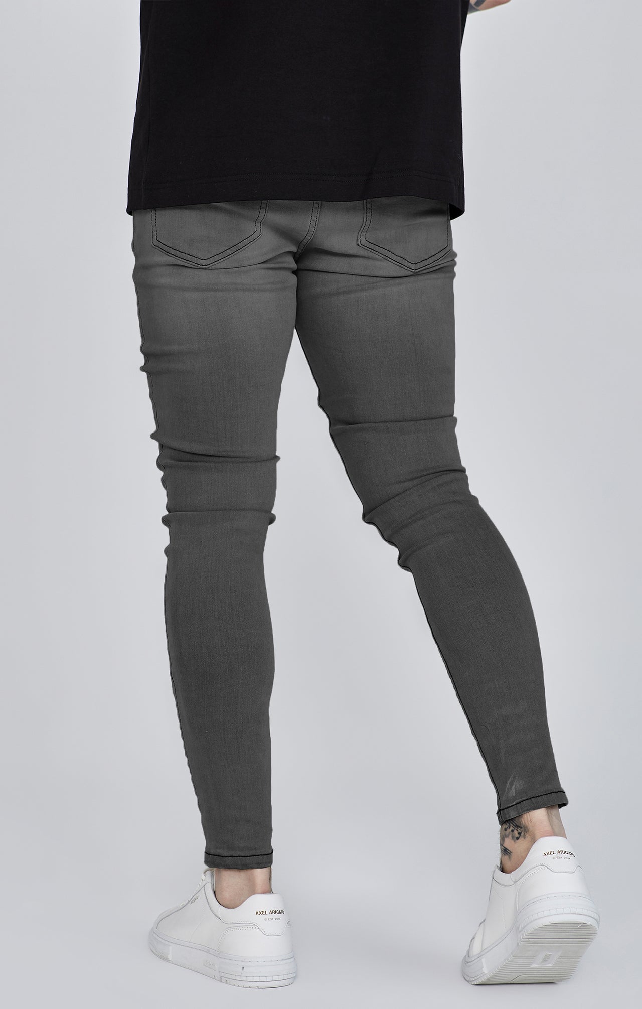 Distressed Skinny Jeans in Grey Jeans SikSilk