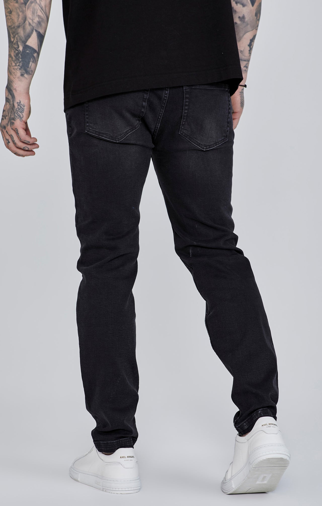 Distressed Slim Fit Jeans in Black Jeans SikSilk
