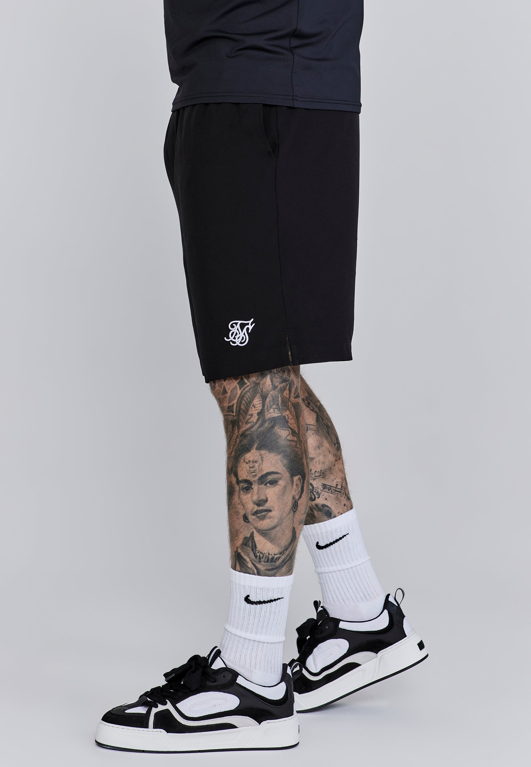 Shorts in Black Shorts SikSilk