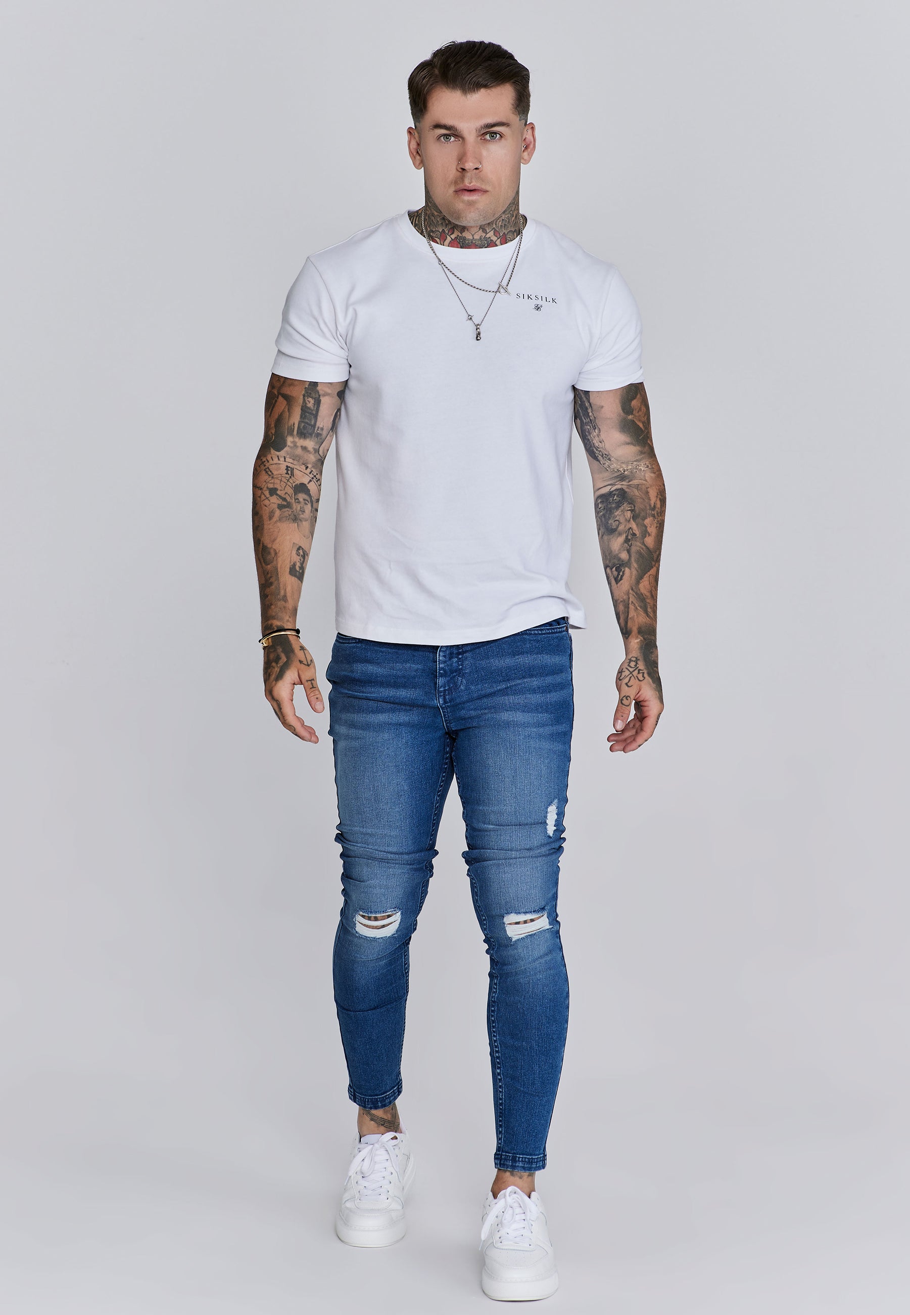 Distressed Skinny Jeans in Blue Jeans SikSilk