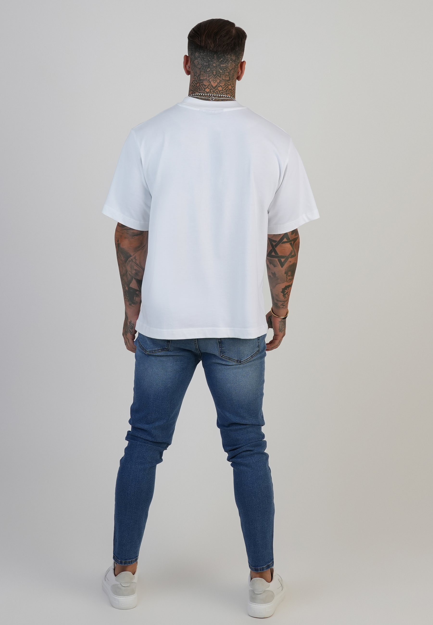 Skinny jeans in washed mid blue jeans SikSilk