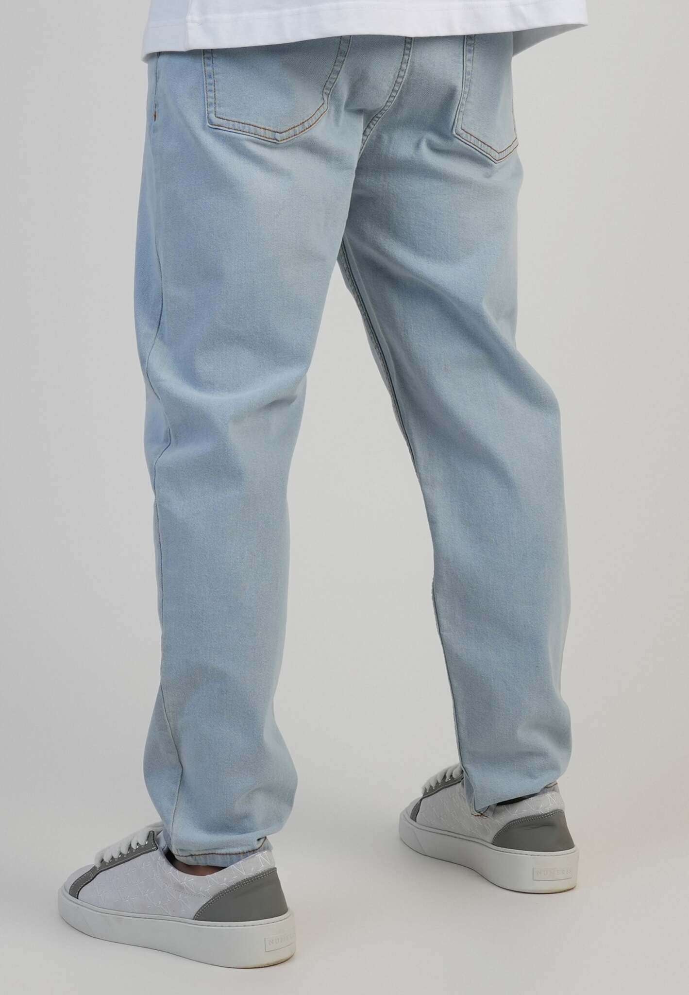 Tapered Fit Jeans in Washed Light Blue Jeans SikSilk