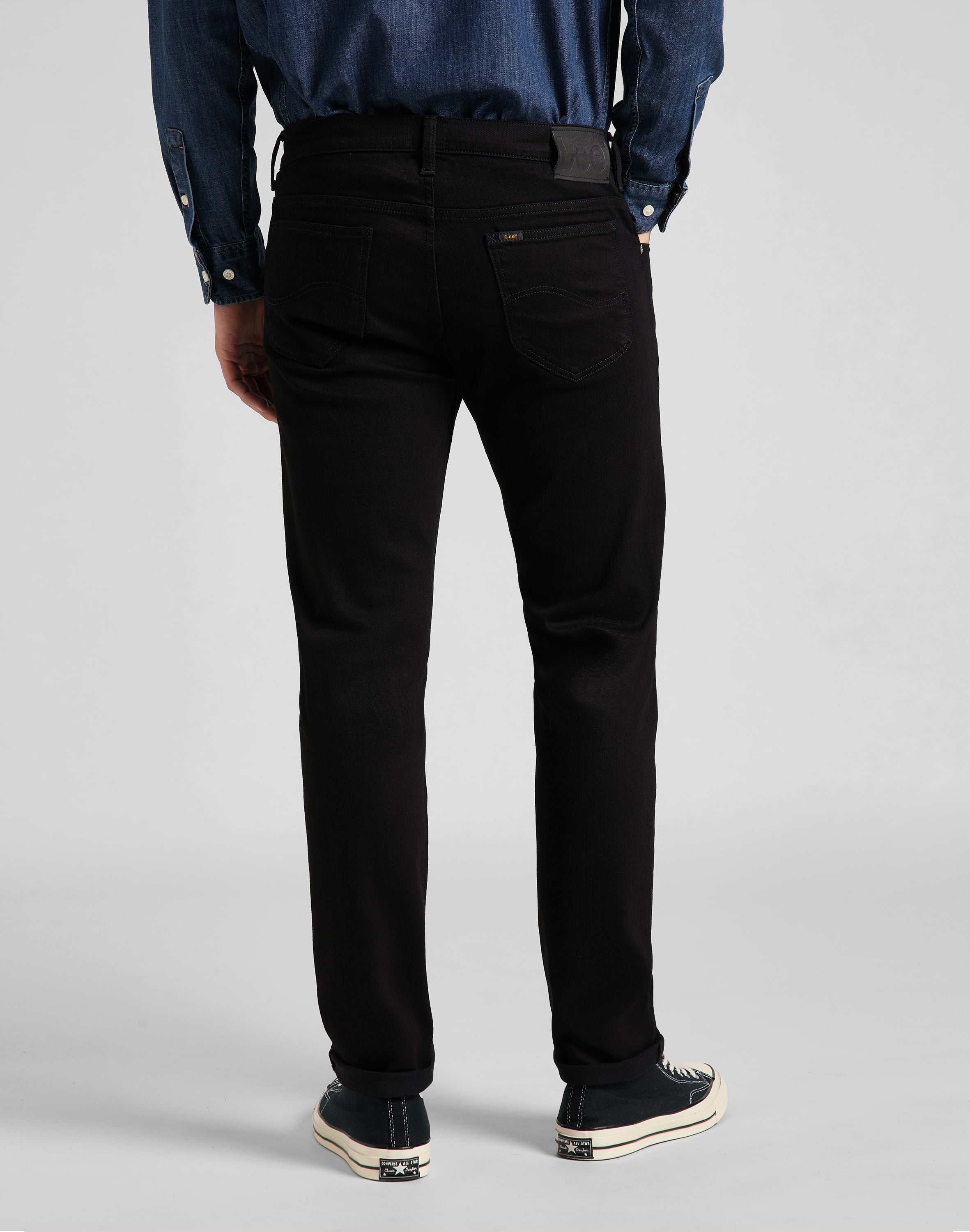 Rider in Clean Black Jeans Lee