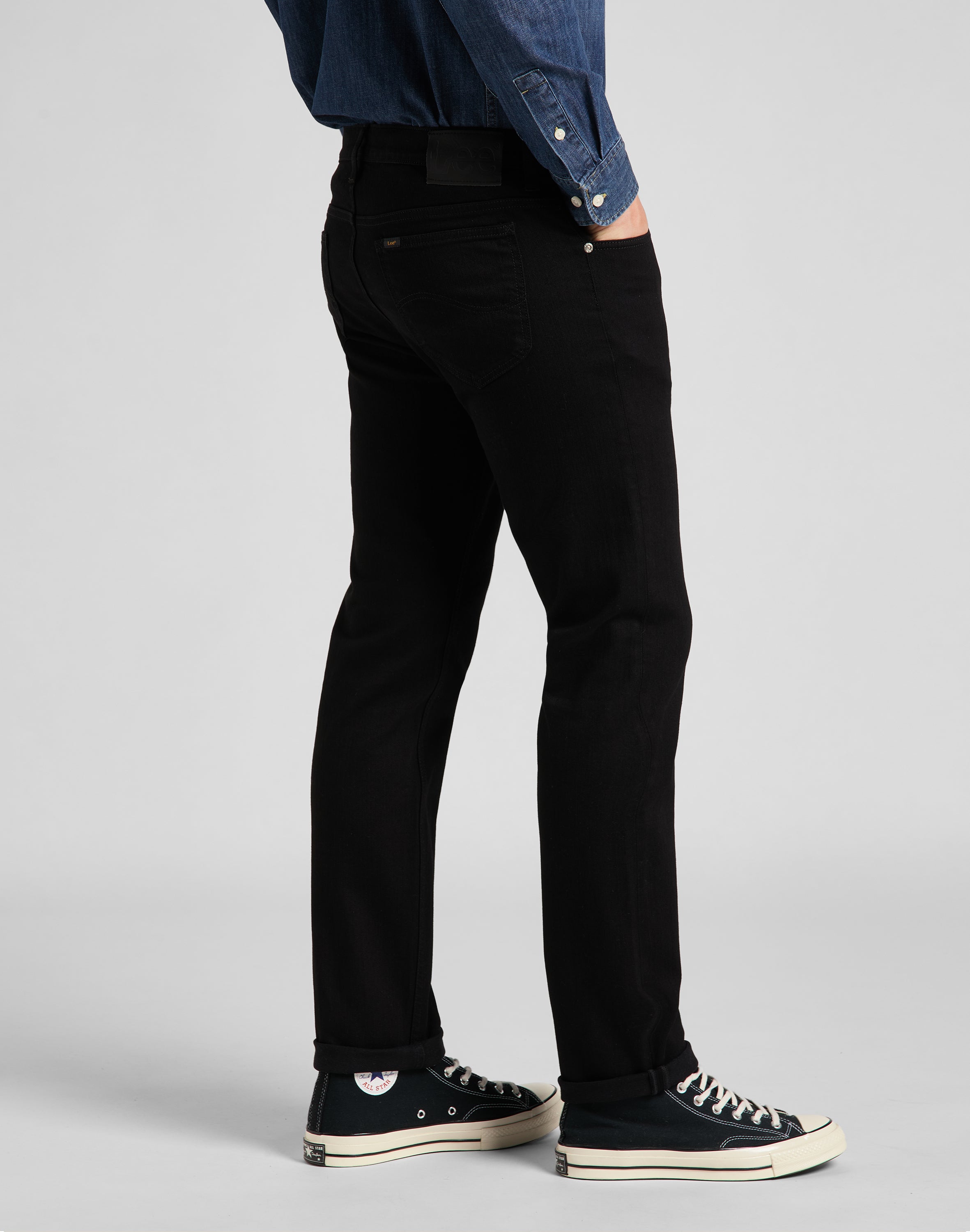 Rider in Clean Black Jeans Lee
