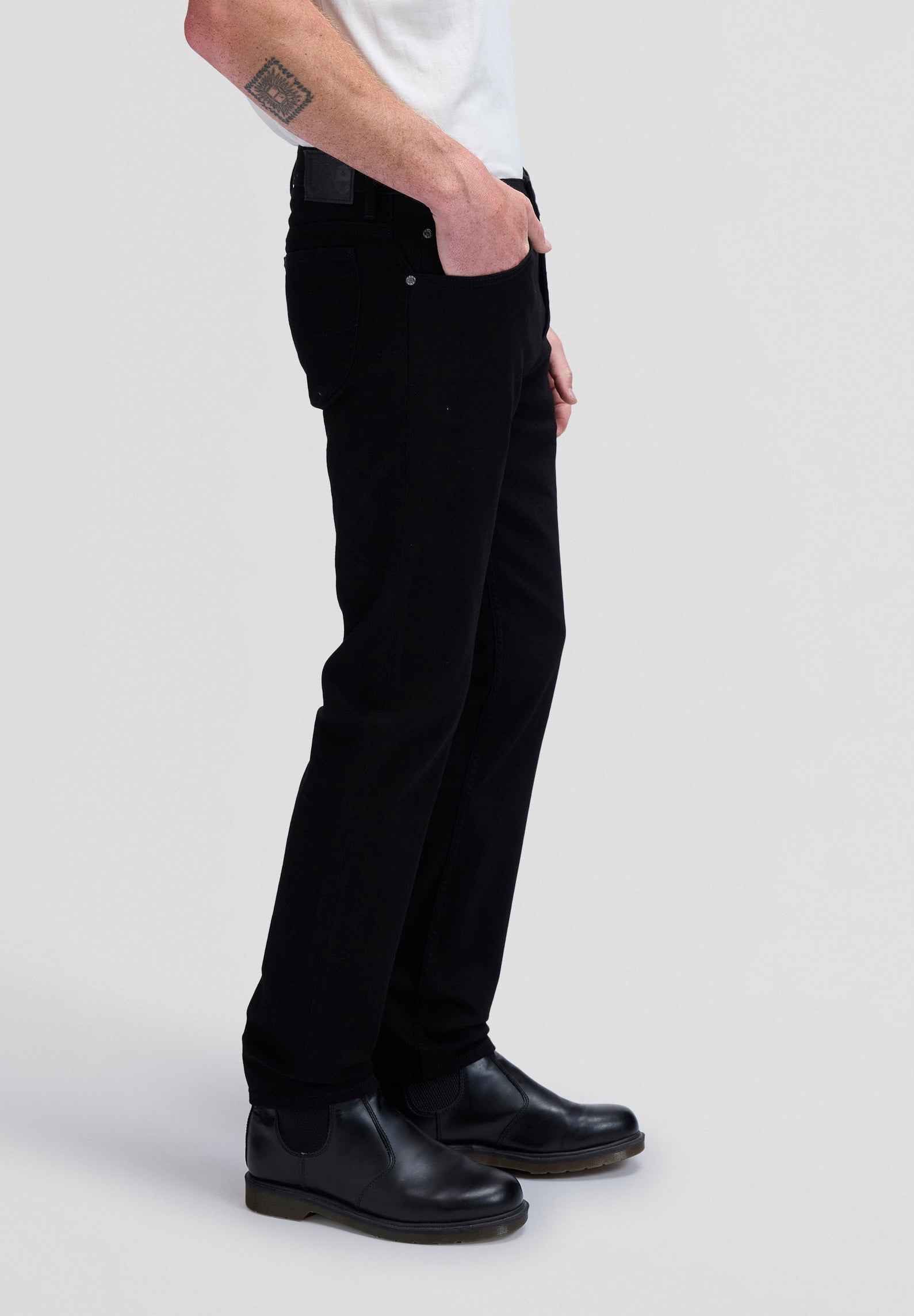 Rider in Clean Black Jeans Lee