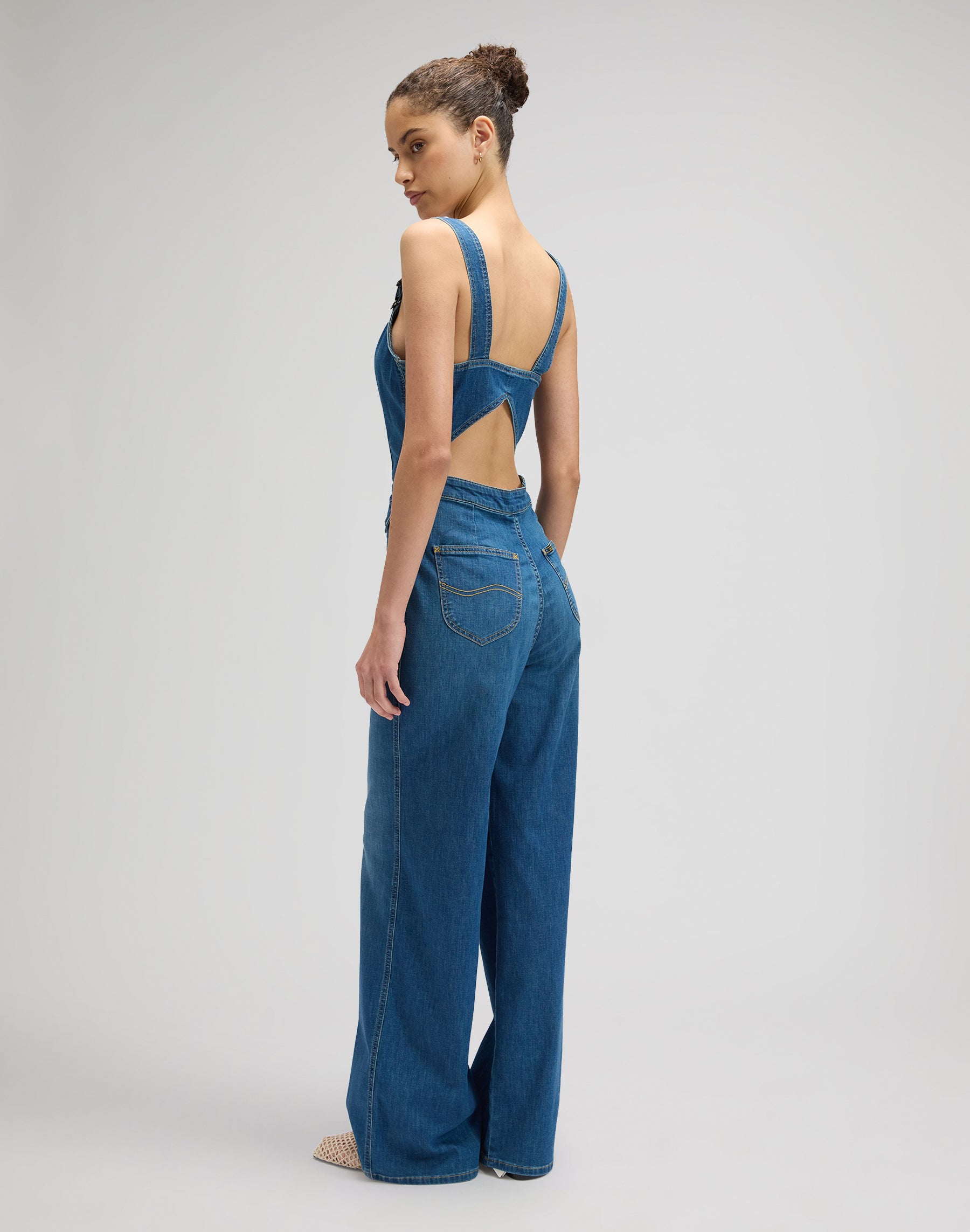 Cut Out Jumpsuit in Blue Arrow Overall Lee