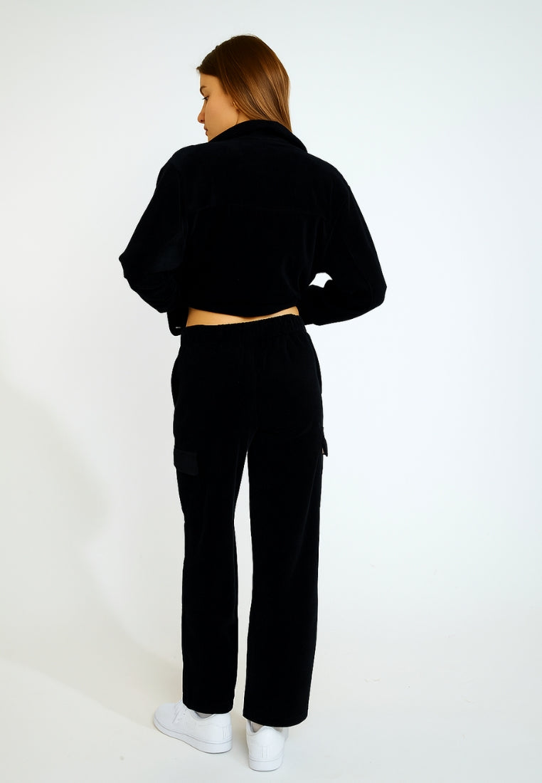 BEYOND-QUANDARY Cord-Jogginghose in Noir Hosen Banana Moon