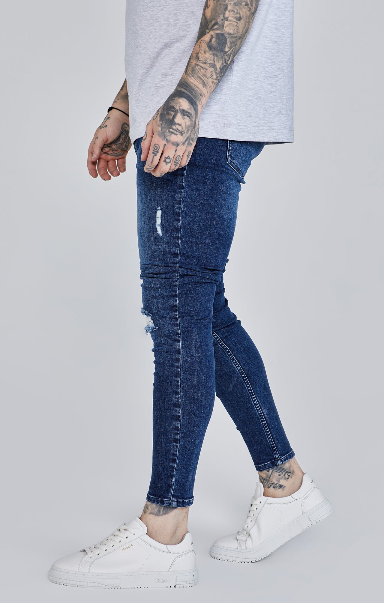 Distressed Skinny Jeans in Blue Jeans SikSilk   