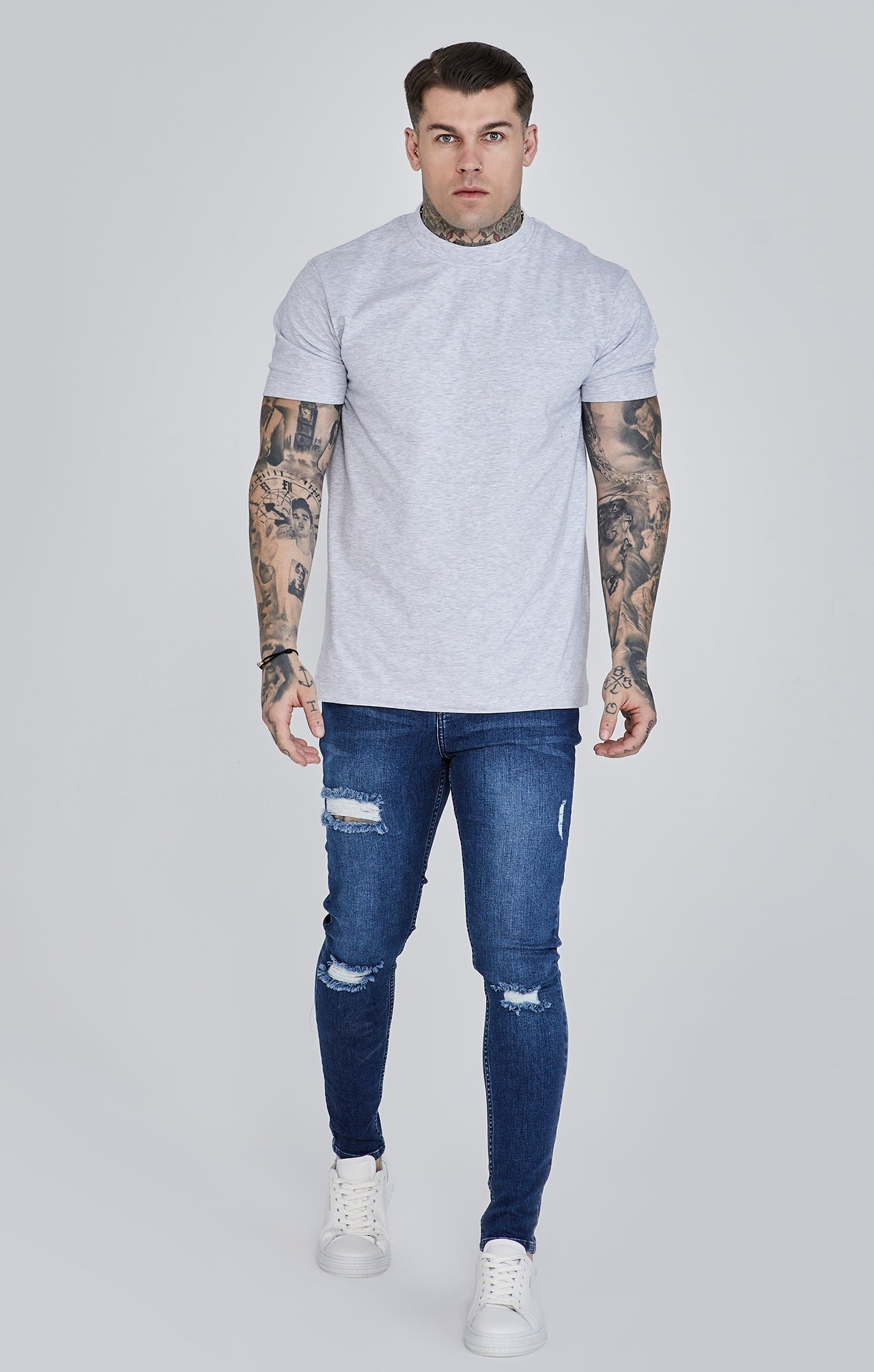 Distressed Skinny Jeans in Blue Jeans SikSilk   