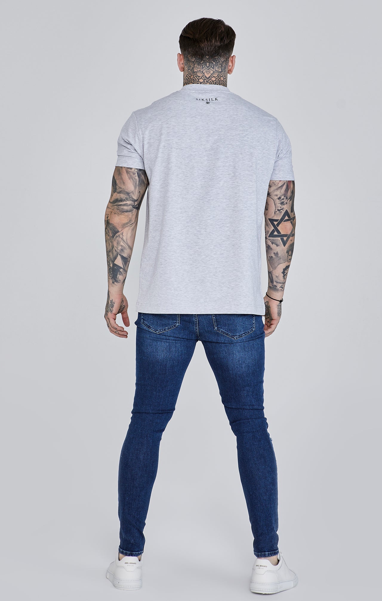 Distressed Skinny Jeans in Blue Jeans SikSilk   