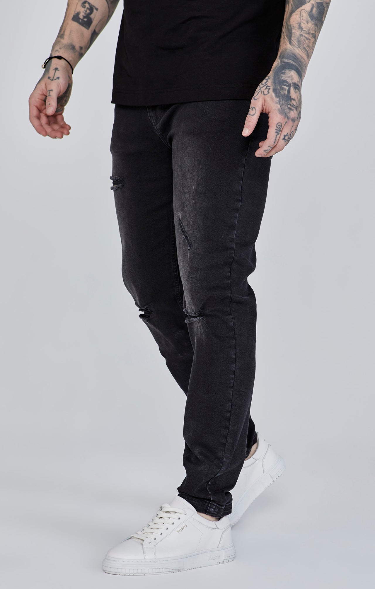 Distressed Slim Fit Jeans in Black Jeans SikSilk   