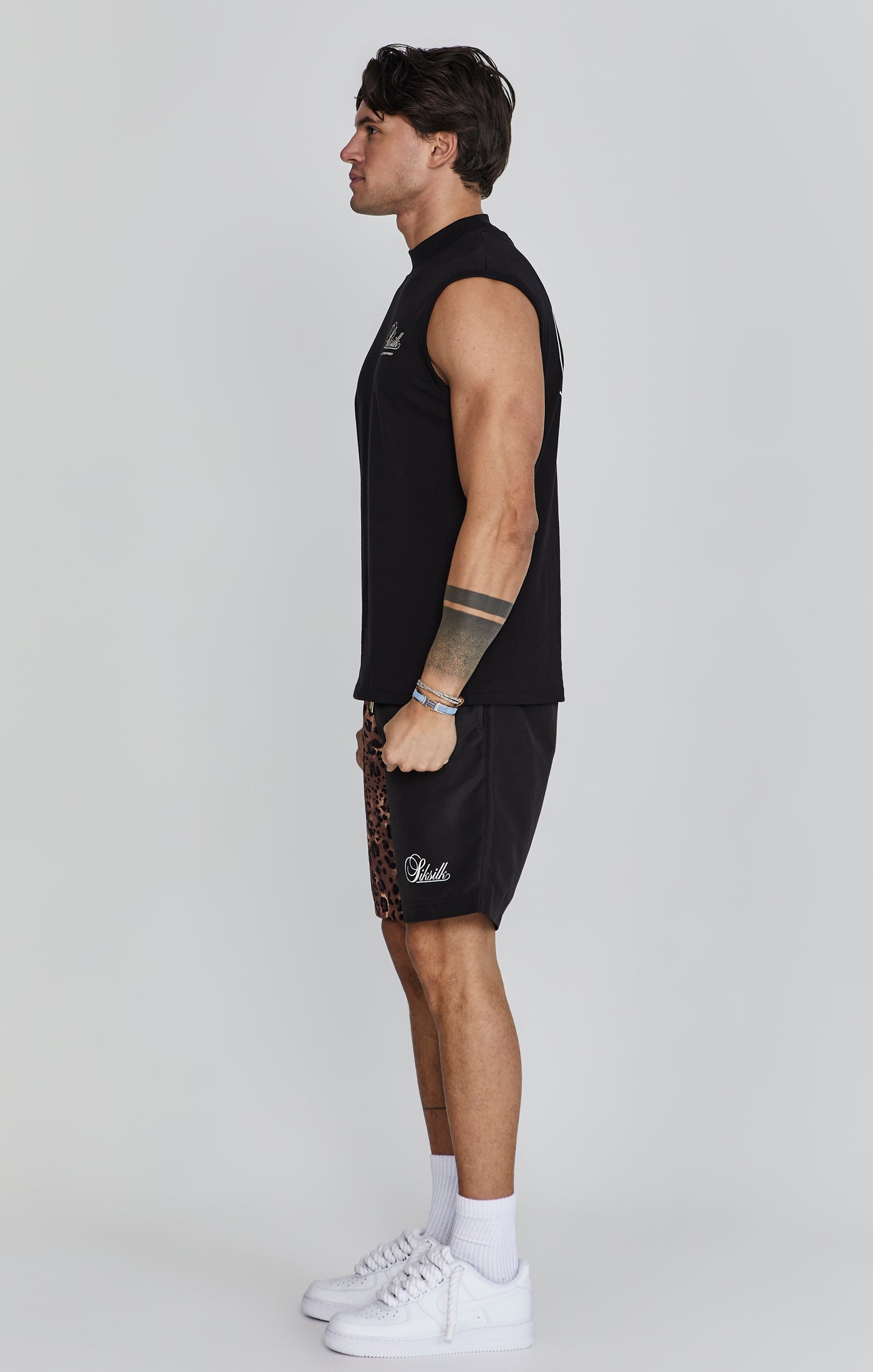 Sleeveless T-Shirt in Black Tops SikSilk   