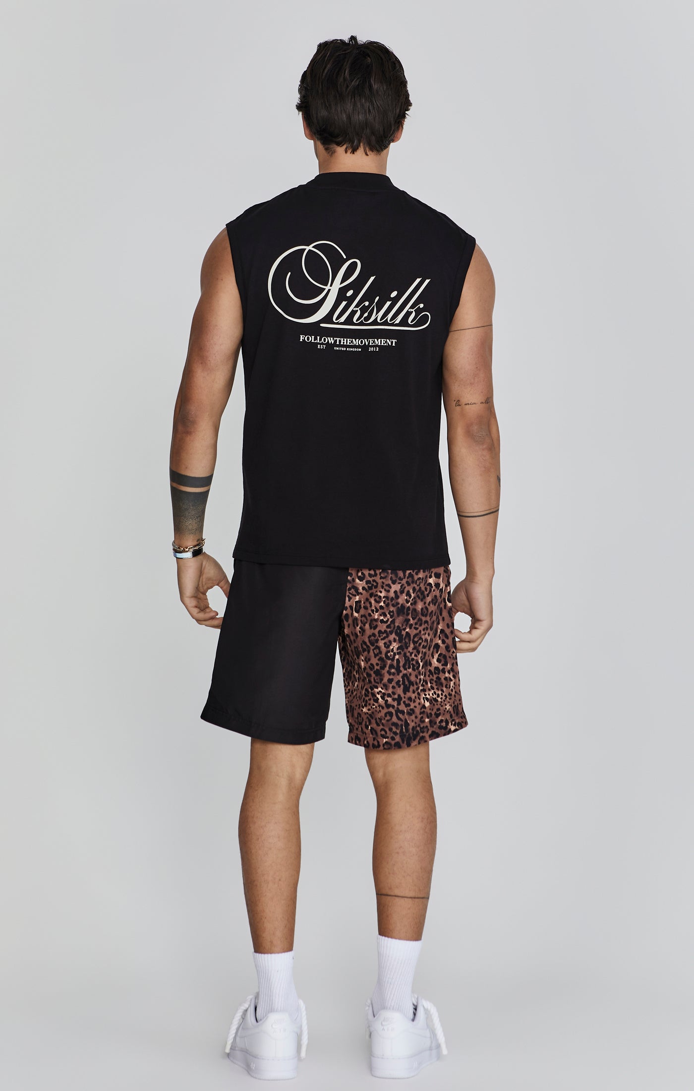 Sleeveless T-Shirt in Black Tops SikSilk   