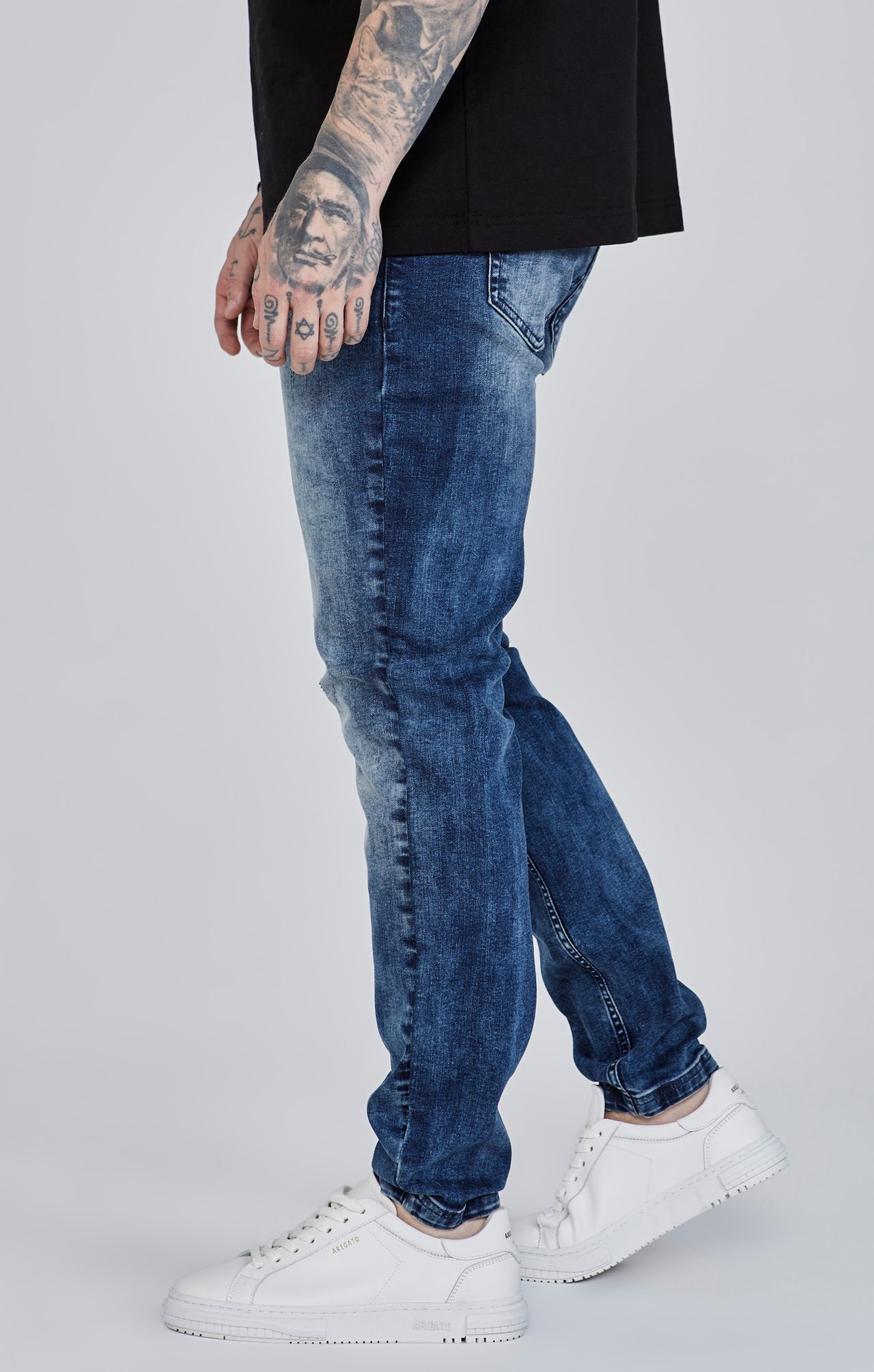 Distressed Slim Fit in Blue Jeans SikSilk   