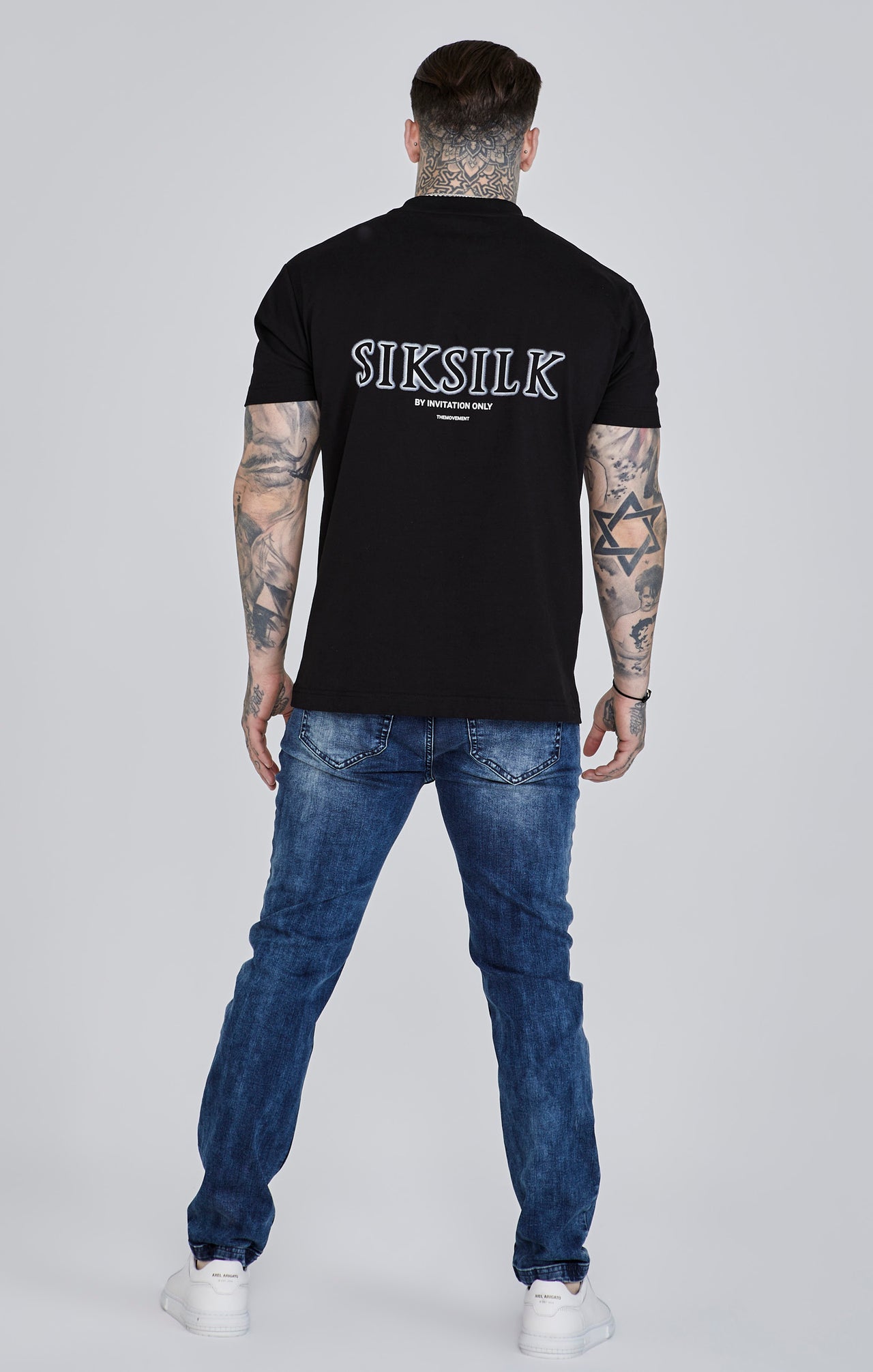 Distressed Slim Fit in Blue Jeans SikSilk   