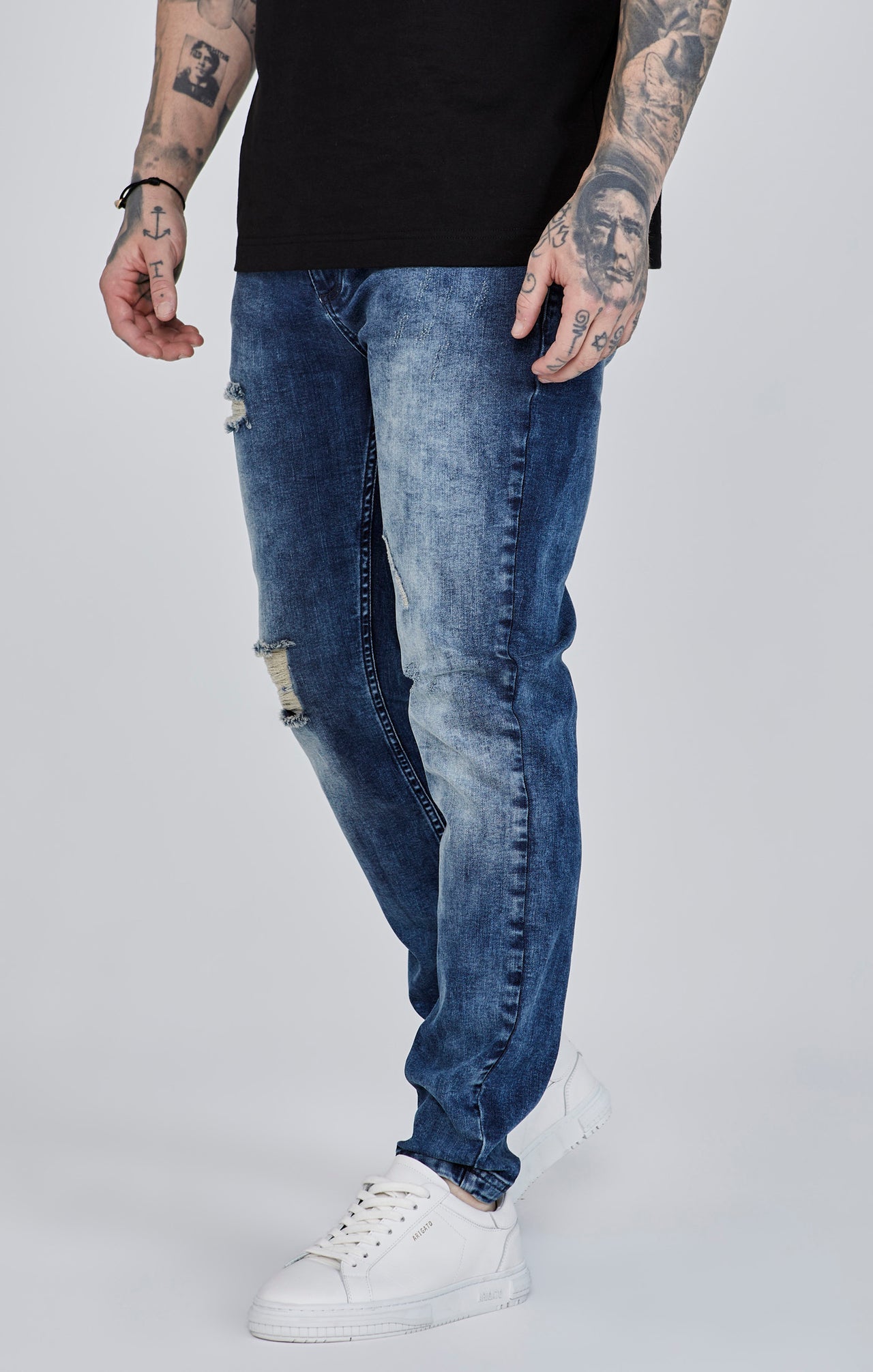 Distressed Slim Fit in Blue Jeans SikSilk   