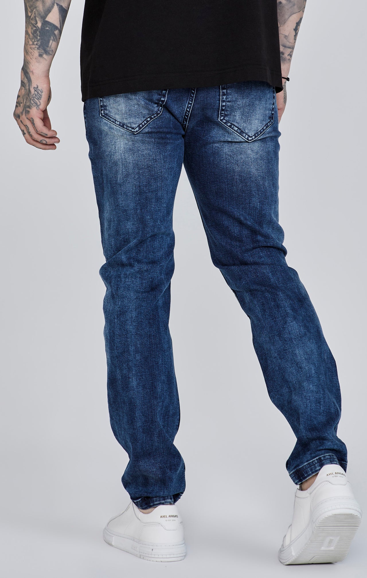 Distressed Slim Fit in Blue Jeans SikSilk   