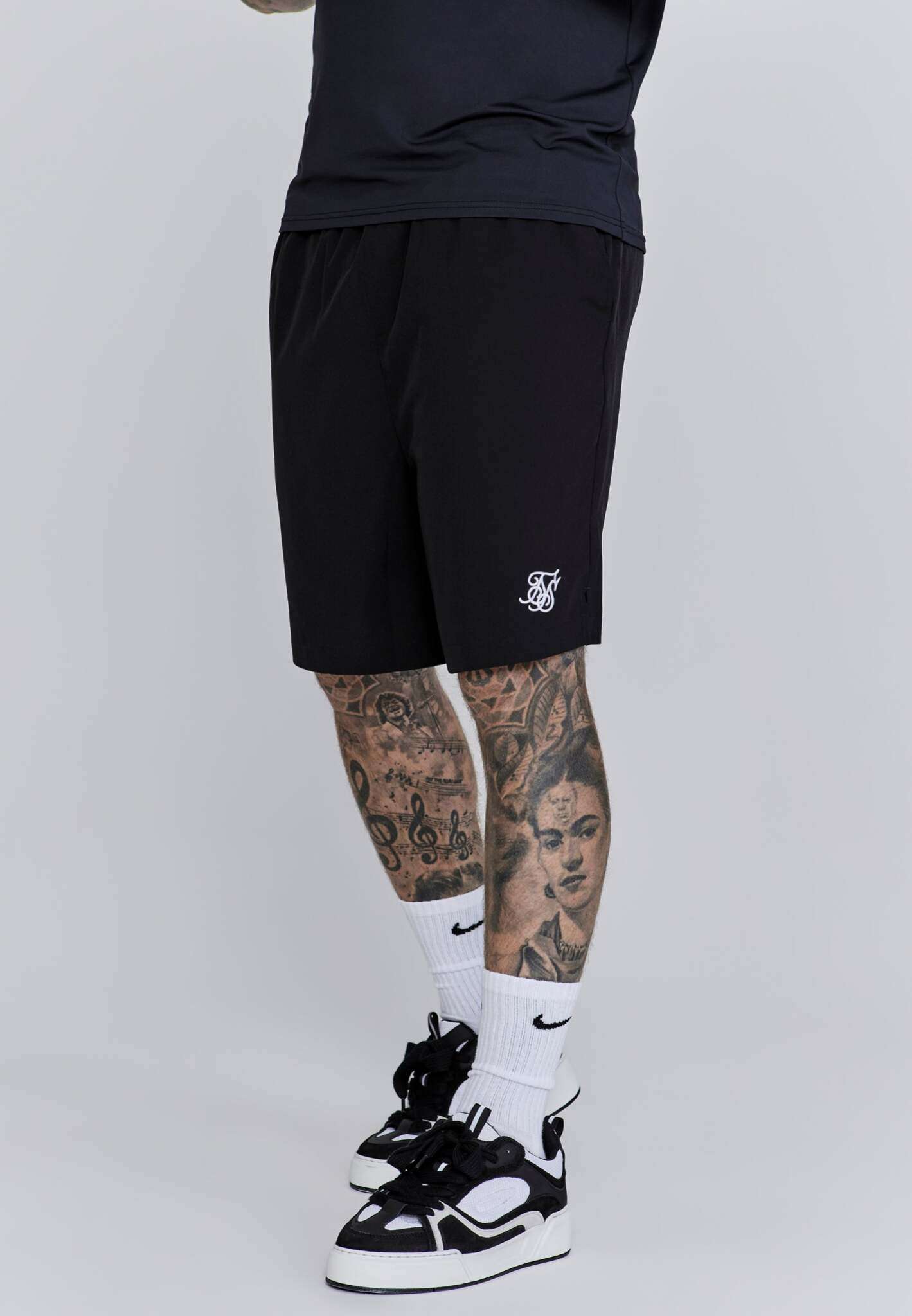 Shorts in Black Shorts SikSilk