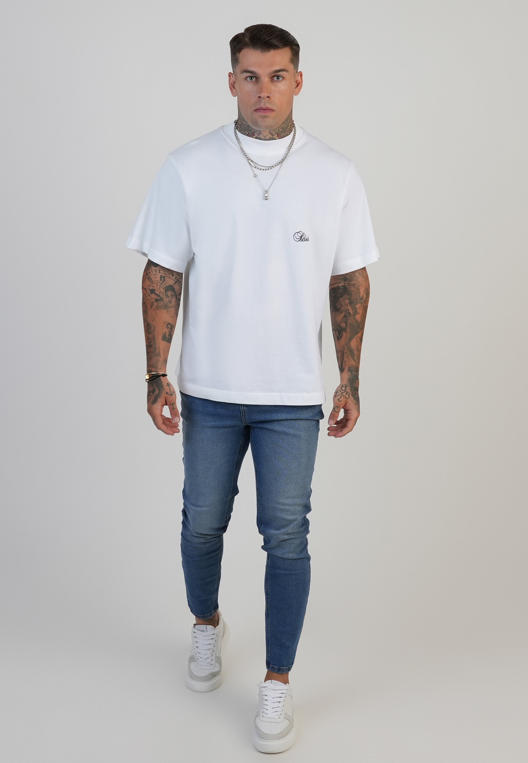 Skinny jeans in washed mid blue jeans SikSilk