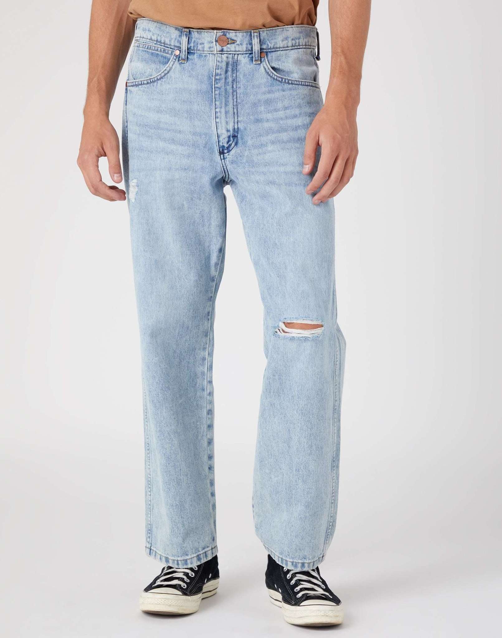 Redding in Ripped Light Wash Jeans Wrangler   